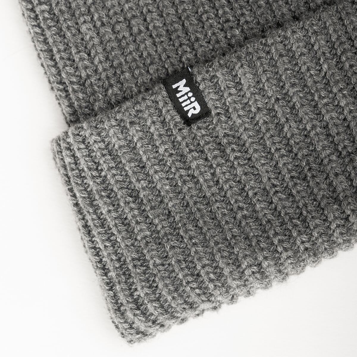 jodie-williams-beanie-x3 WebPDP-RecycledPolyRibBeanie_Studio_TagDetail_GrayHeather__BNE002400OS.jpg